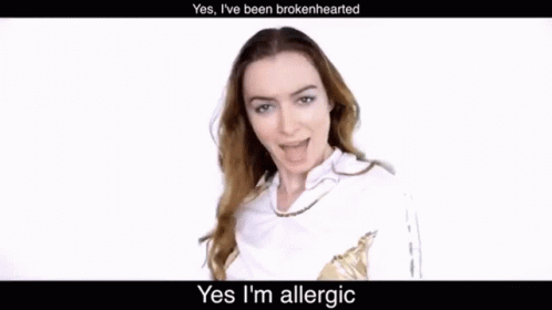 a woman has an allergic expression on her face