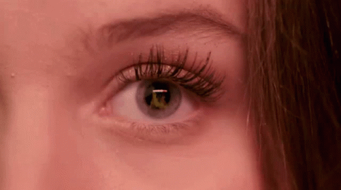 the eye of an evil woman with long lashes