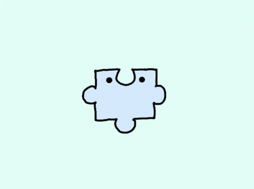 a white piece of puzzle is seen in this picture