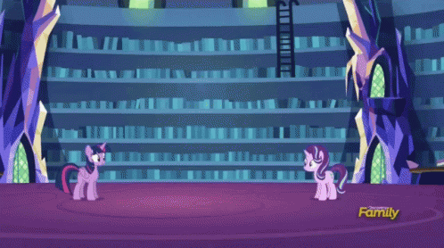 a little pinkie and her sister in front of a theatre