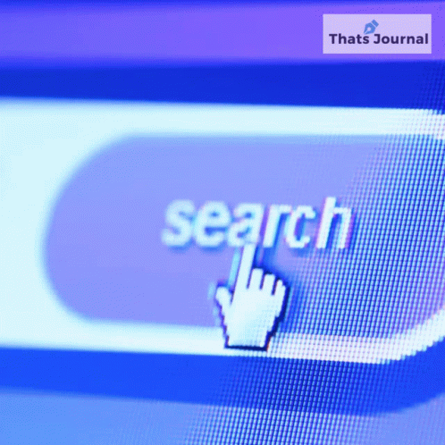 a hand clicking on the search on on a computer