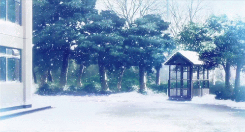 a small pavilion sitting next to a snowy park