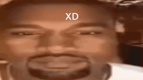 a blurry image of a man with the letters dx on his face