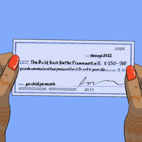 a hand is holding up a check card