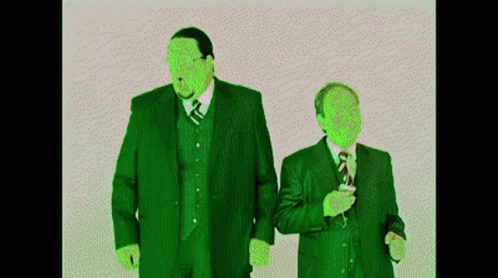two men are in green attire