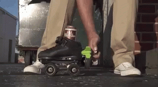an image of the legs and feet of a roller blades