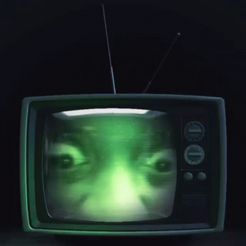 an animated television with a face on the screen