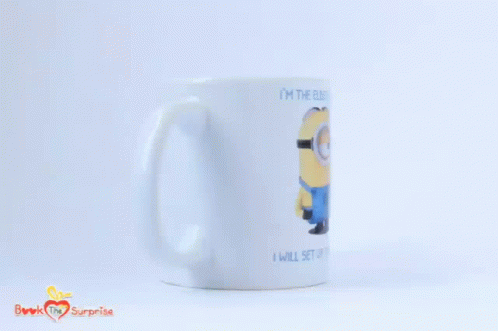 a mug is shown with the characters on it
