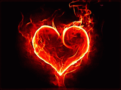 a heart is in the air with blue fire