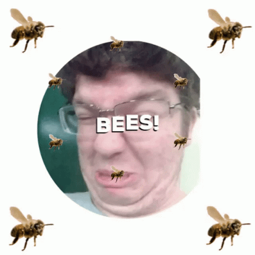 some blue bees are flying around a man
