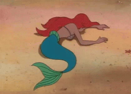 ariel is in the water on her belly