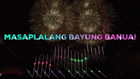 colorful fireworks with words saying masapilan baying banua on the black background