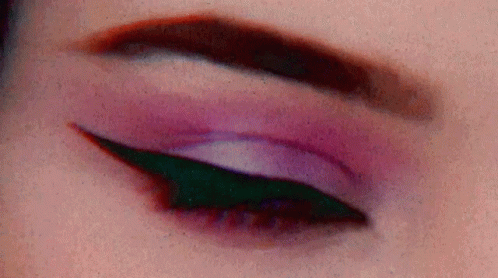 the eye of an individual with makeup on them