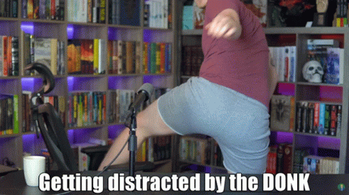 a person is doing a back bend with a video game controller
