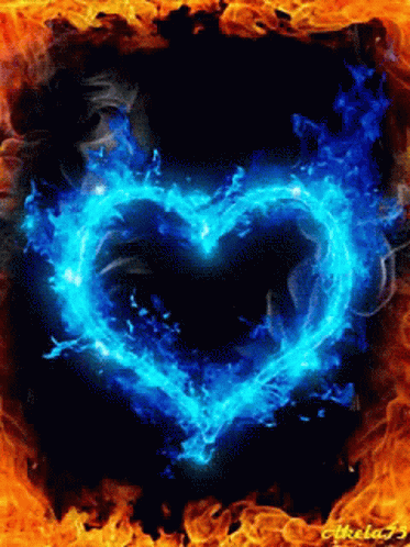 a heart shaped fire blazing on blue background