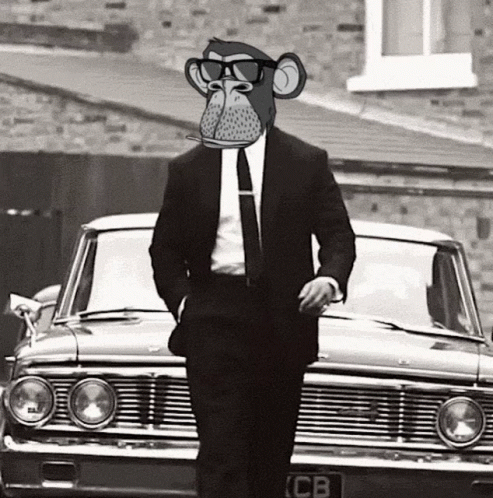 a man with a monkey's head is walking past a car