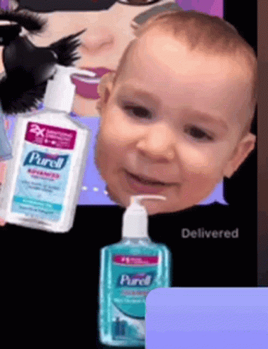 the baby with blue hair is next to soap