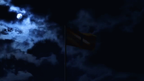 a cloudy sky with a crescented moon, and a blue flag