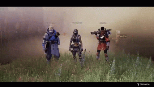 the people are walking through a field while wearing armor