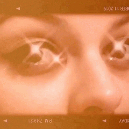 a video screen with a woman's face and mouth
