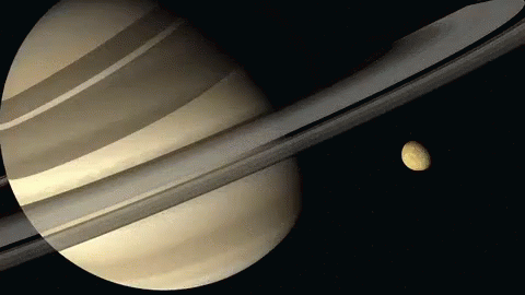 a saturn and its moon as seen by the cassles telescope