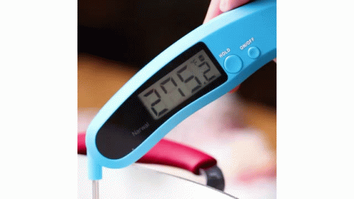 a thermometer is pointing to thermometer for measuring liquids