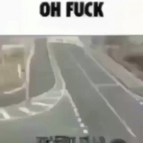 blurry image of the road with two vehicles at one point