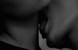 two people are touching nose to nose