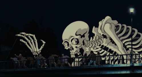 there are people watching skeletons on the bridge
