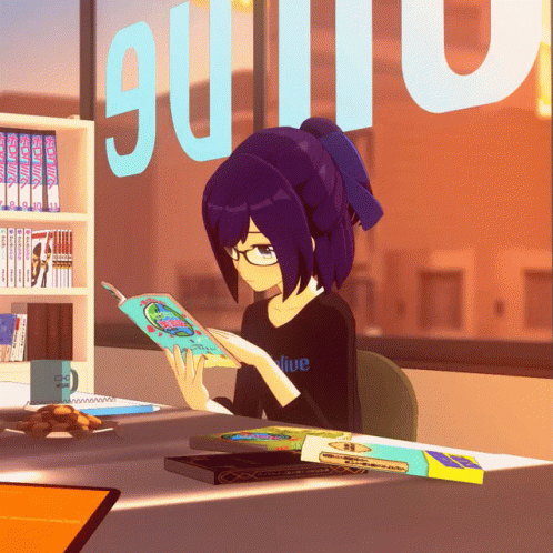 an anime girl sits at a desk with a book