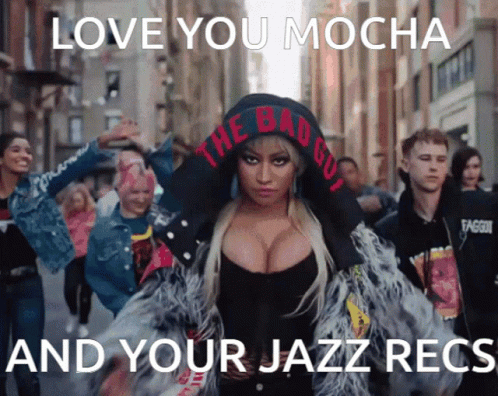 lady wearing headgear walking in street with poster saying love you mocha and your jazz reaction