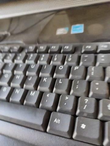 a close up of a keyboard and mouse