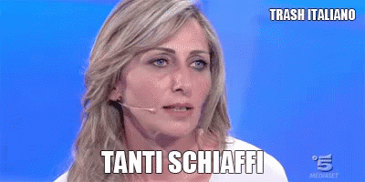 the woman has the words trash italy on her face