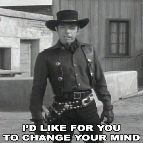 a man in cowboy gear is shown in an old po