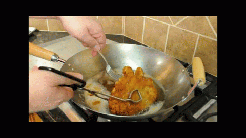 the person is cooking blue stuff in the pan
