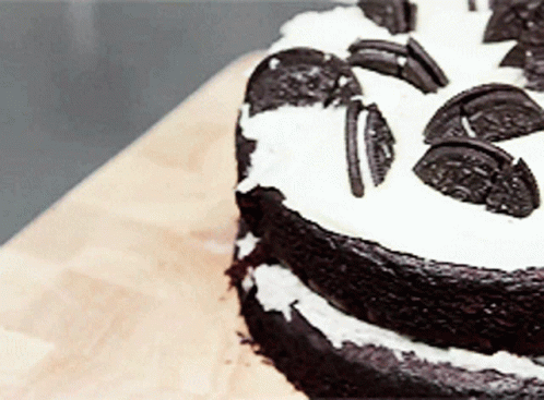 a cake with black and white icing on it