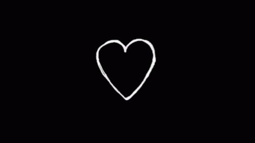 a heart is shown in the darkness with only the outline visible