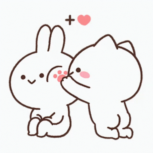 two cute rabbits one on the other hugging