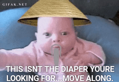 a white baby with a blue hat on it's head