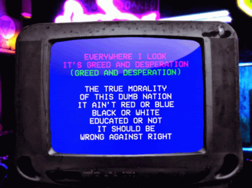 an old tv with writing in red on the screen