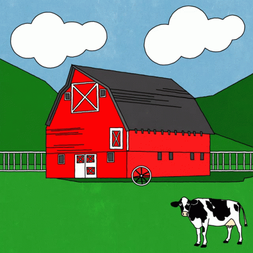 a cow stands in front of a blue barn