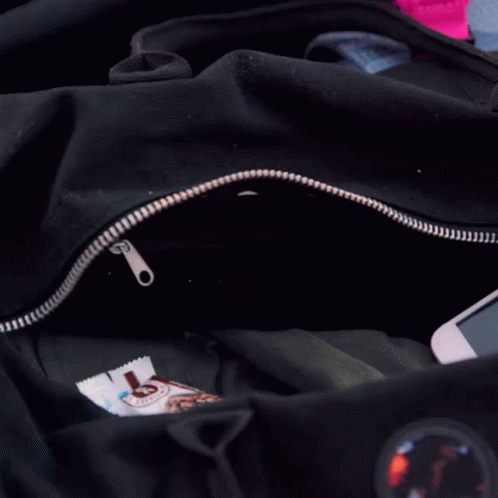 there is an electronic device inside of a black bag