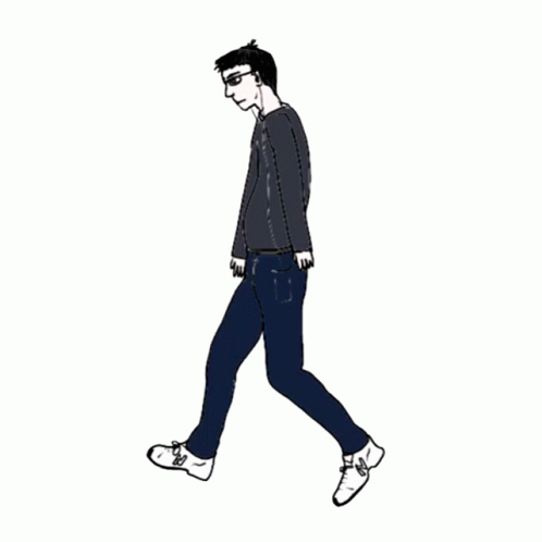 a boy is walking on the street wearing dark pants