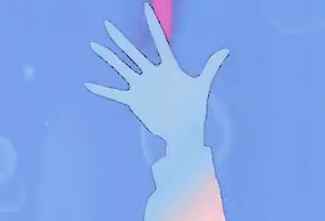 a blurry picture of a hand reaching up into the air