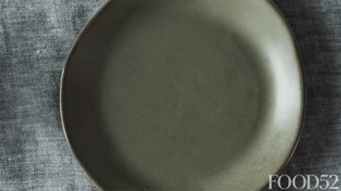 a gray plate on a table