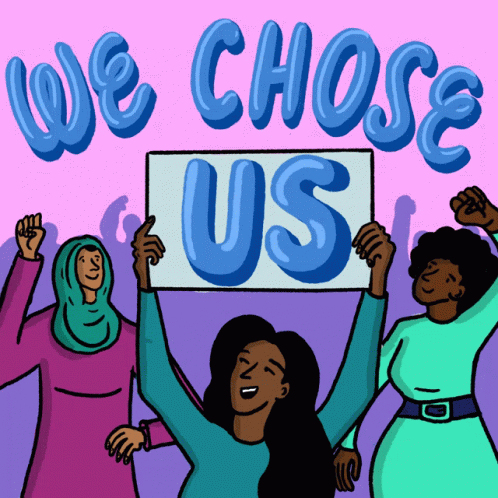 three women holding a sign that says we choose us