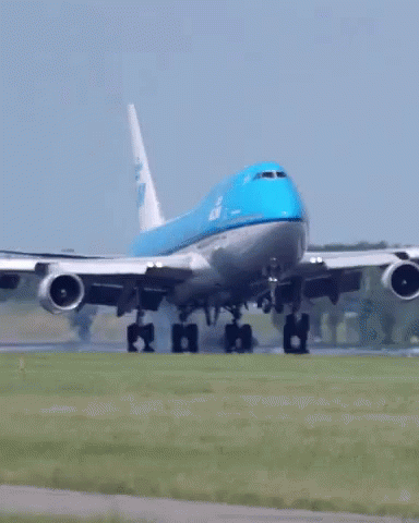 an airplane is taking off from a runway