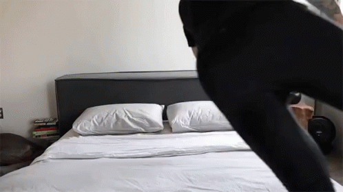 this is an elephant tail sticking out from the bed
