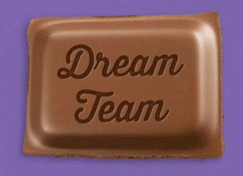 a blue square sign that reads dream team
