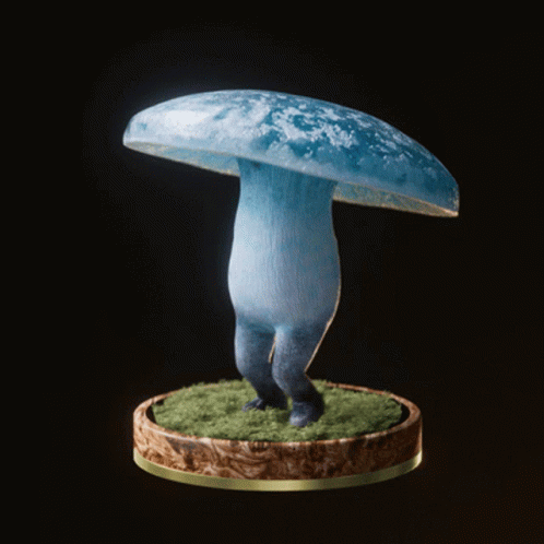 a small white mushroom standing on top of a blue base